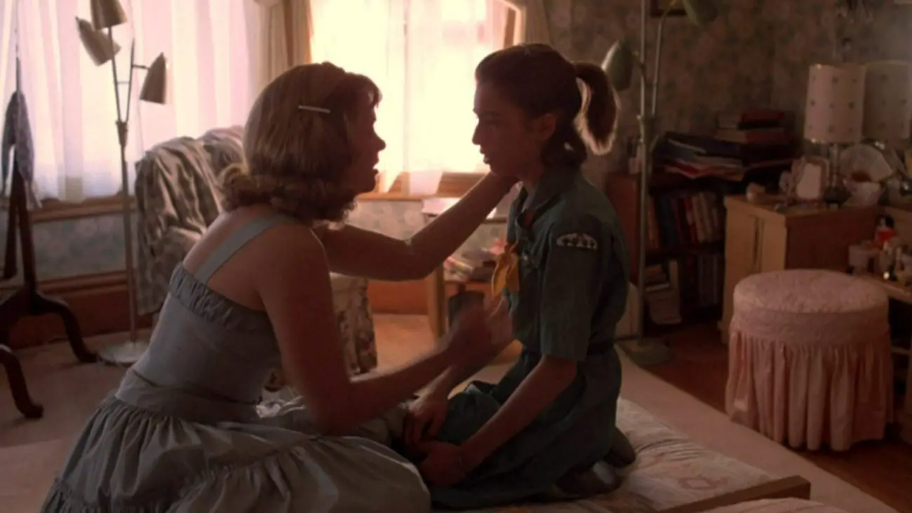 Kathleen Turner embraces Sofia Coppola in Peggy Sue Got Married.