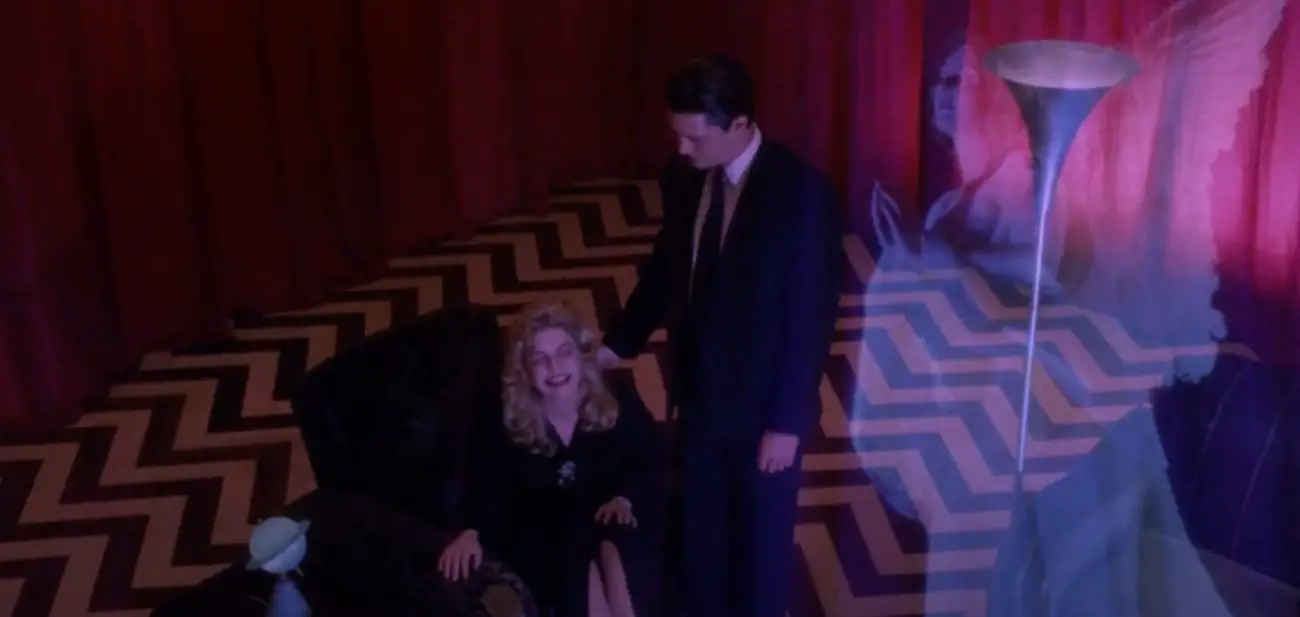 Laura Palmer sitting , Dale Cooper standing above her