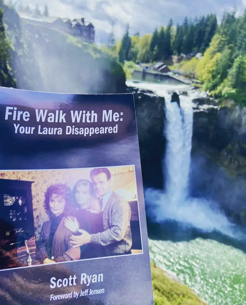 Fire Walk With Me book in front of falls