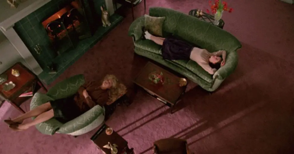 donna and Laura lay on couches