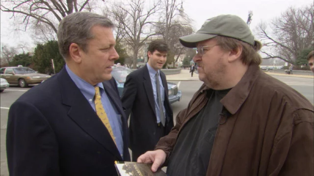 Michael Moore talks with Congressman John Tanner on Capitol Hill in Washington, D.C. in Fahrenheit 9/11