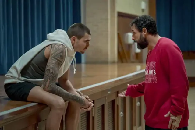 Stanley Sugerman (Adam Sandler) tries to inspire Bo Cruz (Juancho Hernangómez) following a tough scrimmage in HUSTLE