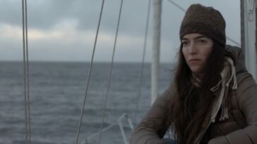 Dom (Dominique Braun) on a sailing boat in Get Away If You Can