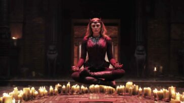 Wanda Maximoff levitating above a ring of candles