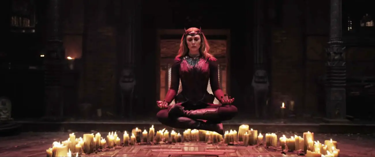 Wanda Maximoff levitating above a ring of candles