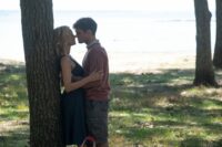 Connor kisses Marilyn against a tree