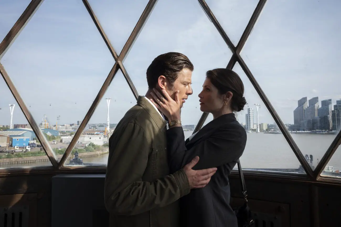 James Norton as Robert and Gemma Arteron as Alice embracing in Rogue Agent. 