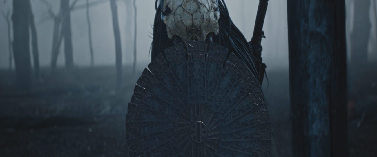The Predator, sporting shield and bone headdress