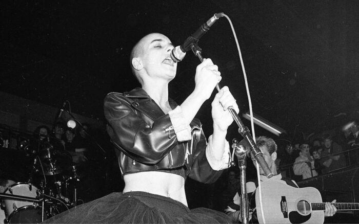 Sinéad O’Connor performing in Dublin at the Olympic Ballroom in 1988, as seen in NOTHING COMPARES,