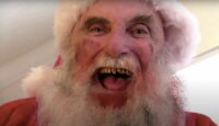 A close-up on a smiling Cannibal Claus