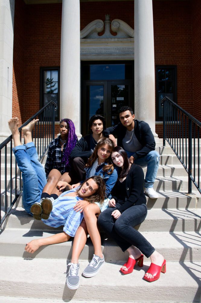 A group of high school students pose on entry steps in "The Class"