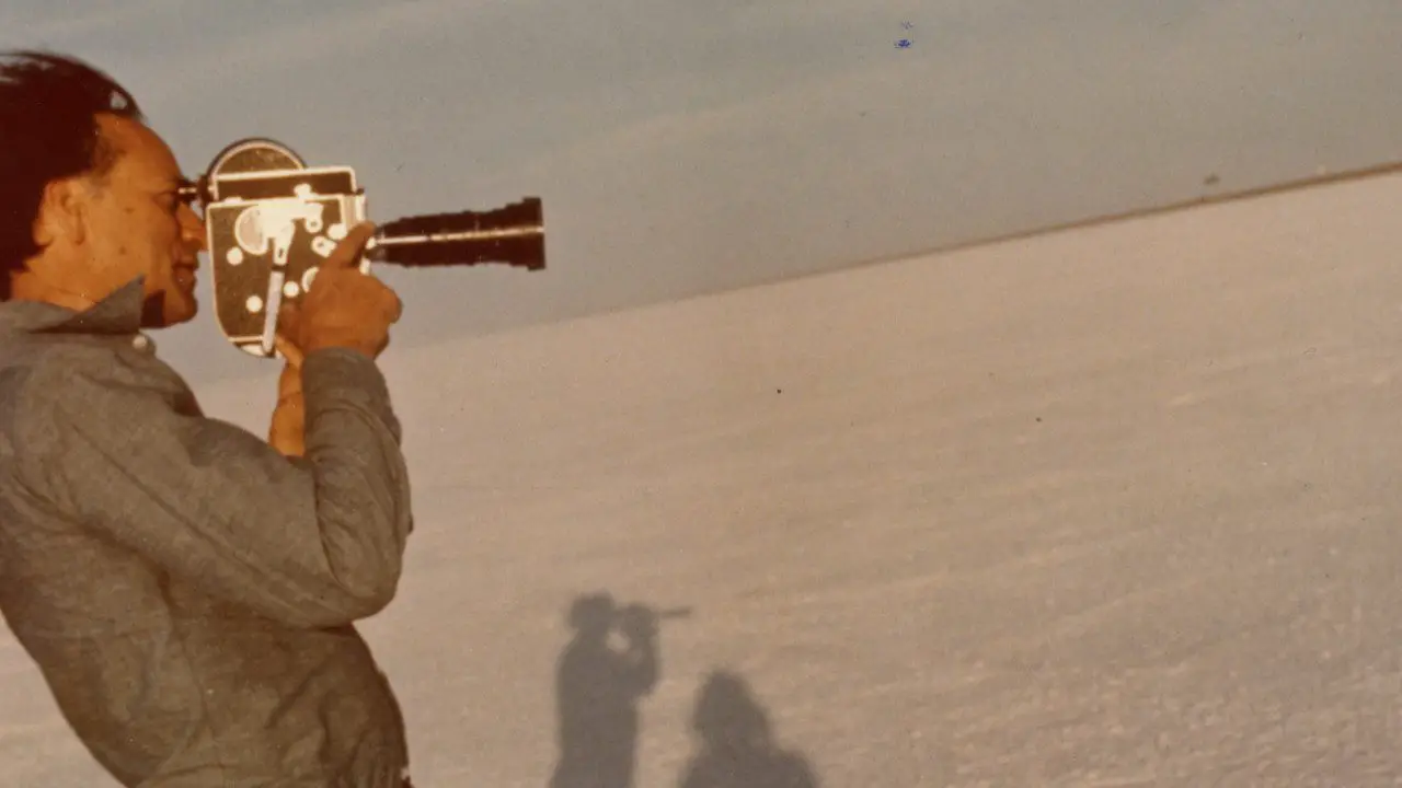 Jonas Mekas with his movie camera