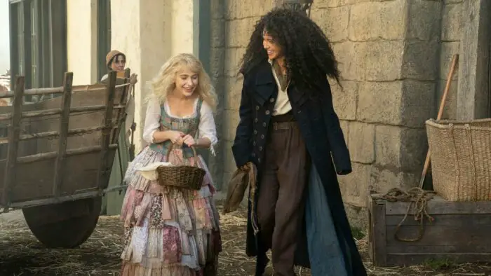 Sophia Anne Caruso and Sofia Wylie walk through the town their from at the beginning of the film. They're both smiling and a little grimy.