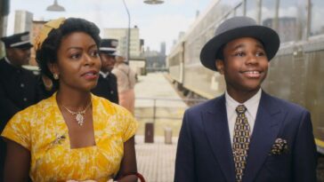 A well-dressed mother and son meet some on a train platform in "Till"