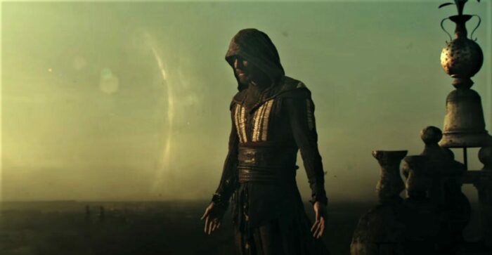 Michael Fassbender in full dress as one of the hooded assassins in the film adaptation of Assassins Creed 