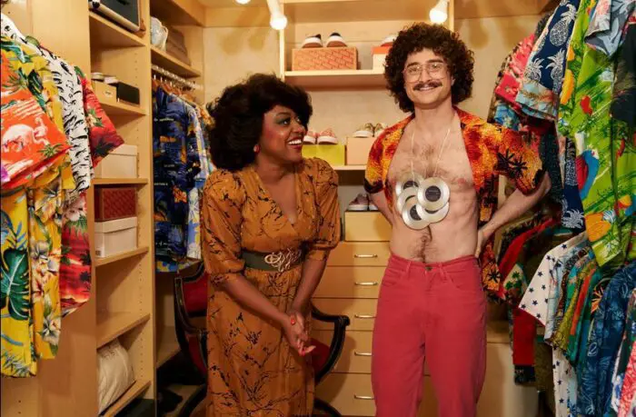 Quinta Brunson as Oprah Winfrey interviewing Weird Al (Daniel Radcliffe) in his closet