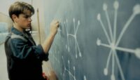 Will Hunting writes on chalk board in Good Will Hunting