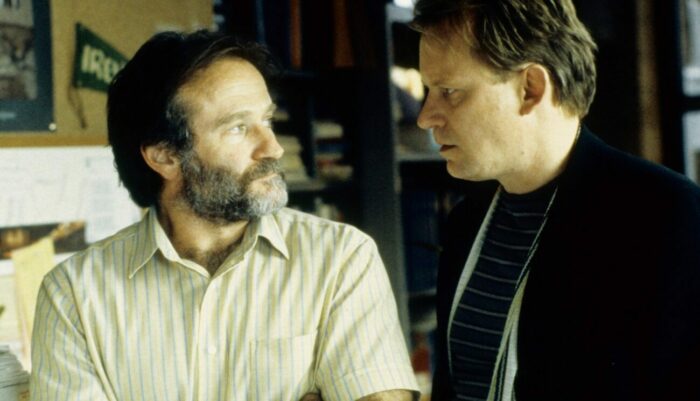Sean and Lambeau look at one another in Good Will Hunting