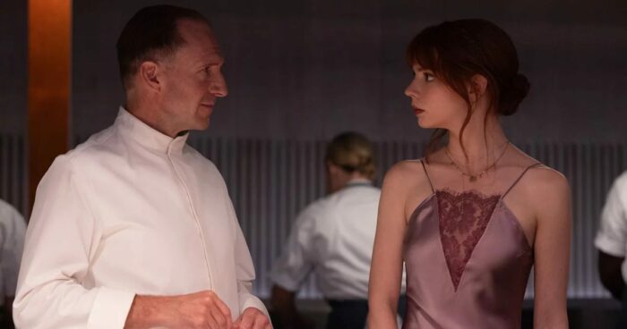 Ralph Fiennes, left, with Anya Taylor-Joy in “The Menu.”