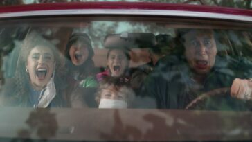 The Gladney family in their car, screaming