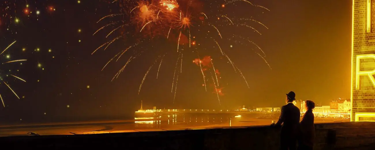 Two people watch a fireworks display in Empire of Light
