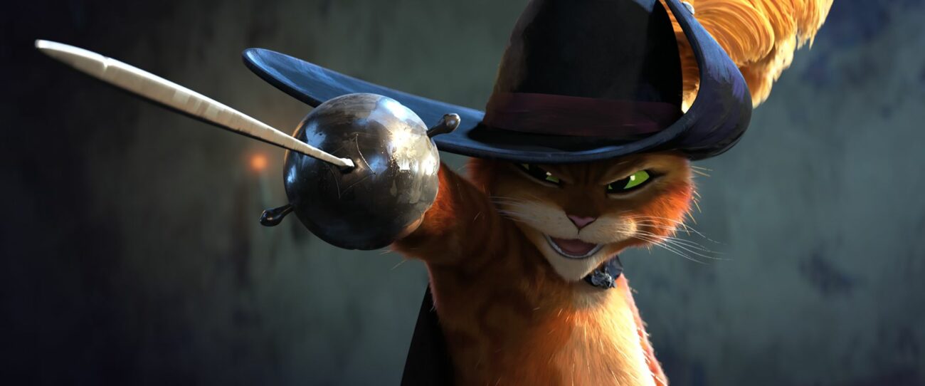 A cat points a sword at a foe.