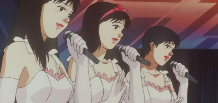 Mima, center, and the other members of Cham performing a song