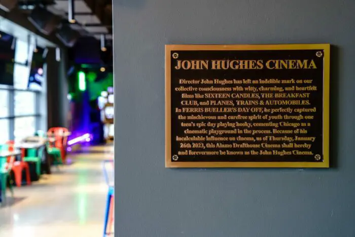 A plaque titled "John Hughes Cinema" commemorates the Alamo Drafthouse Chicago