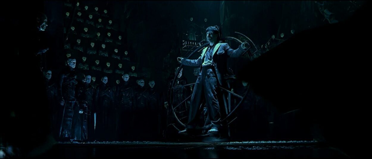 John attached to a device in Dark City