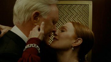 A woman pulls an older man down for a kiss in Sharper