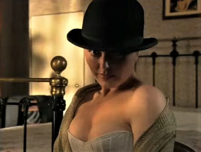 Angeline Ball as Molly Bloom in the 2003 adaptation of Ulysses by James Joyce entitled Bloom... seen here wearing a white corset and black bowler hat