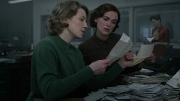 Two women look over a folder of evidence in Boston Strangler