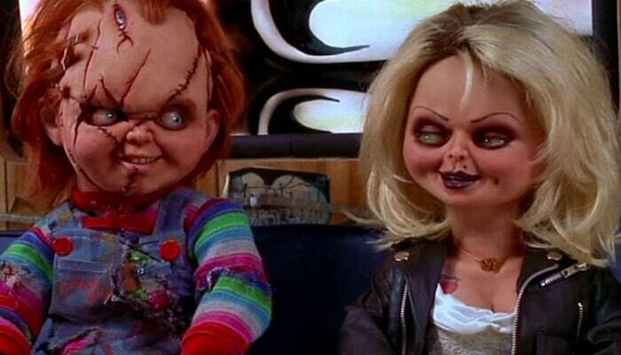 Brad Dourif as Chucky (left) and Jennifer Tilly as Tiffany (right) in Bride of Chucky (Universal Pictures)