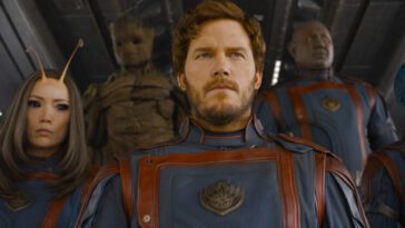 Star-Lord stands in front of his team at the entrance of his ship in Guardians of the Galaxy Vol. 3