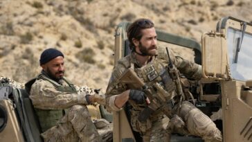 Dar Salim (left) as Ahmed and Jake Gyllenhaal (right) as Sgt. John Kinley in THE COVENANT, directed by Guy Ritchie, a Metro Goldwyn Mayer Pictures film. Credit: Christopher Raphael / Metro Goldwyn Mayer Pictures © 2023 Metro-Goldwyn-Mayer Pictures Inc. All Rights Reserved.