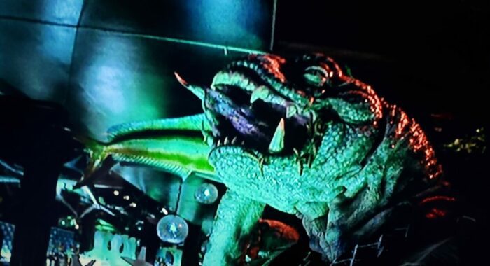 Giant anthropomorphized lizard in a Las Vegas lounge from Fear and Loathing in Las Vegas (1998). Screen capture off Criterion Collection DVD.