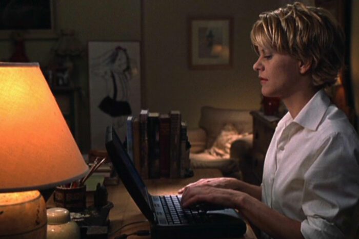 Meg Ryan at her computer in You've Got Mail.