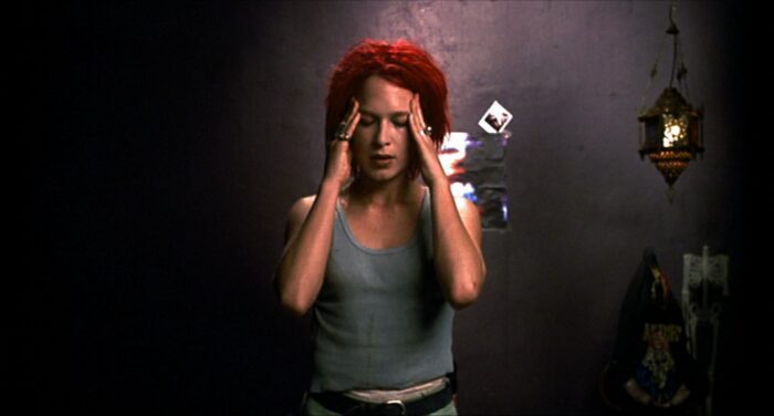 Lola pushes her mind to think in Run Lola Run