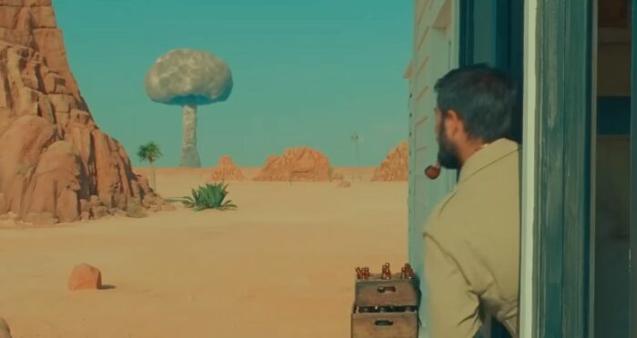 An atomic bomb's mushroom cloud is seen in Asteroid City.