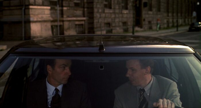 Mr Meyers and Lola's father drive away to their fate in Run Lola Run