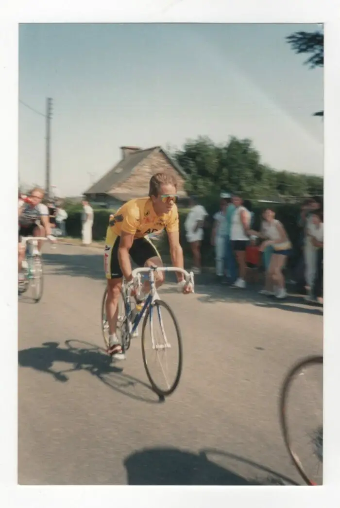 Greg LeMond rides in the Tour de France.