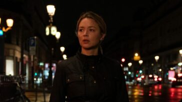 Virginie Efira in REVOIR PARIS, walking at night in Paris.