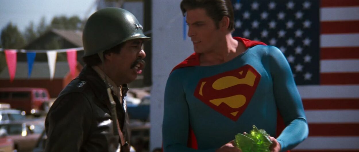 Superman accepts a gift from a pretend general.