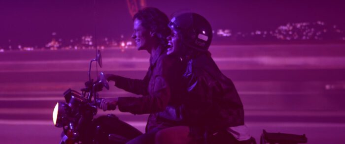 Two women on a motorcycle