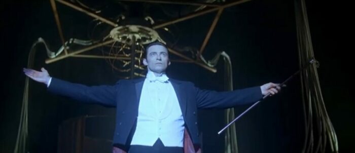 Hugh Jackman on stage in the role of Robert Angier in The Prestige