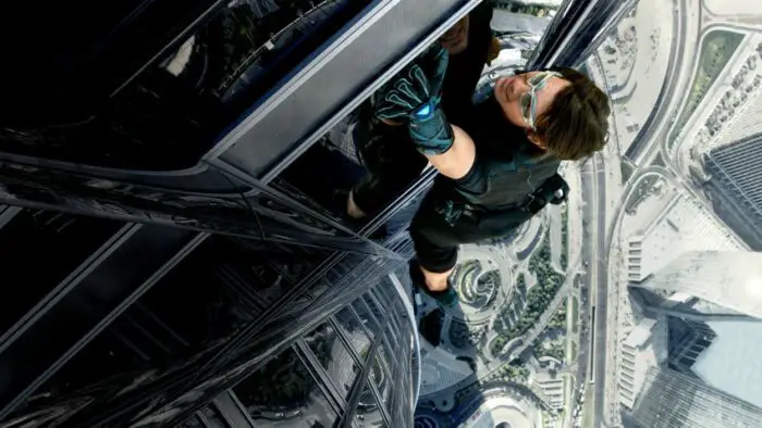 Image from MISSION: IMPOSSIBLE GHOST PROTOCOL showing Ethan Hunt climbing the Burj Khalifa in Dubai. 