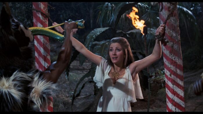 Jane Seymour as Solitaire, gasping in shock as she is prepared for human sacrifice.