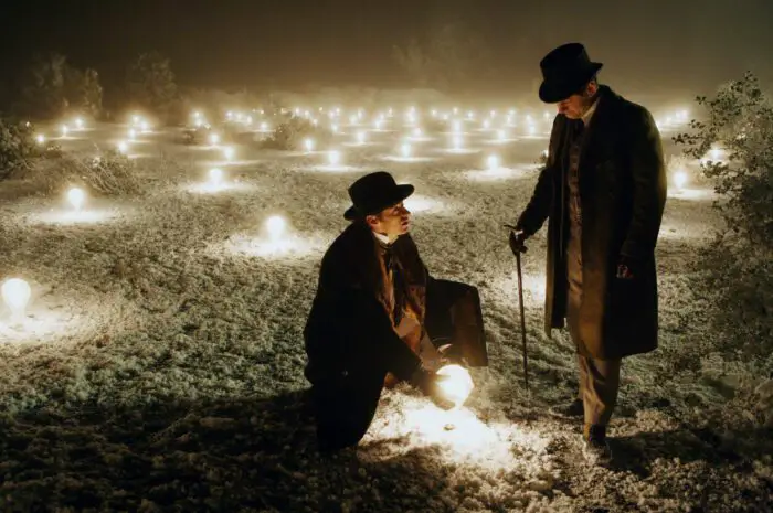 Hugh Jackman (left) as Robert Angier and Andy Serkis (right) as Alley in The Prestige (Warner Bros.)