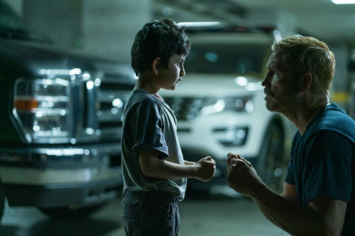 Jim Caviezel speaks to a child in Sound of Freedom.