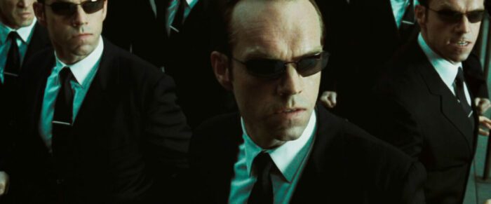 Multiple Smiths ready to attack Neo in The Matrix Reloaded